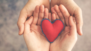Hand holding heart